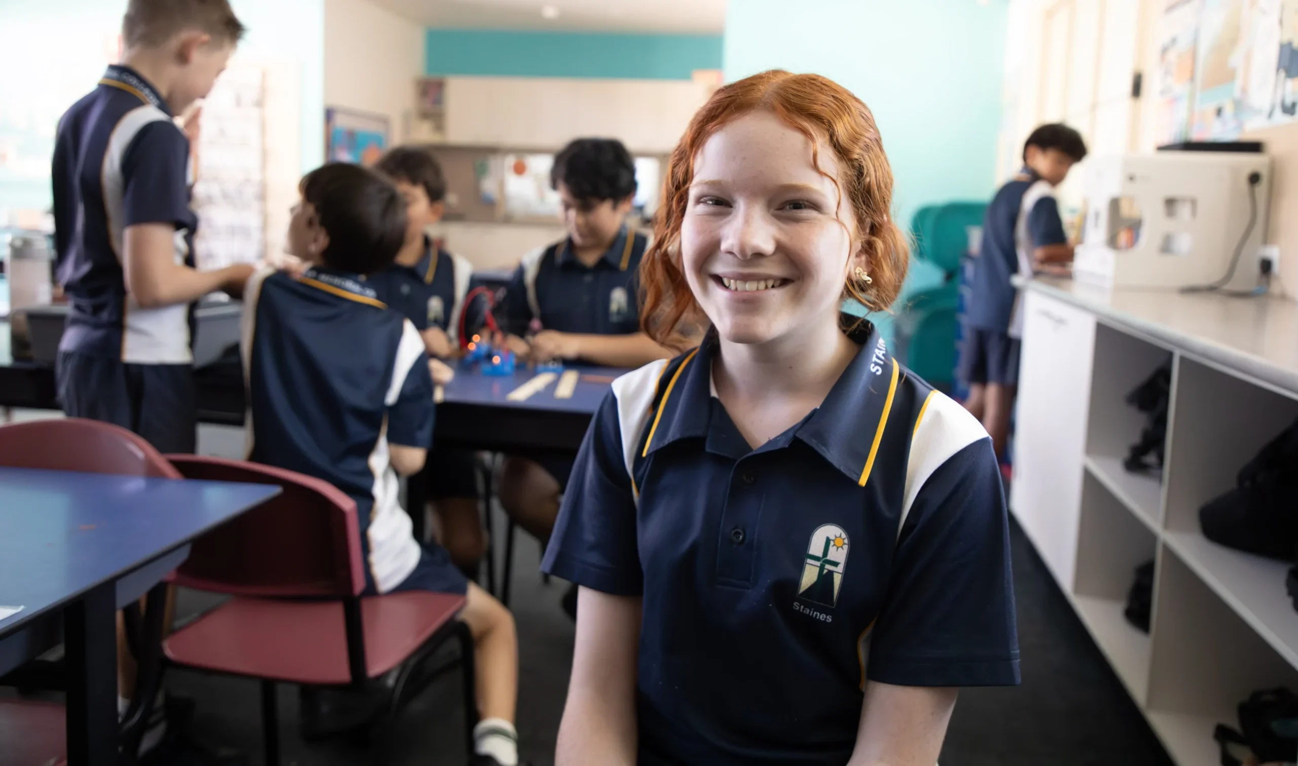 Private High School student sitting in their classroom