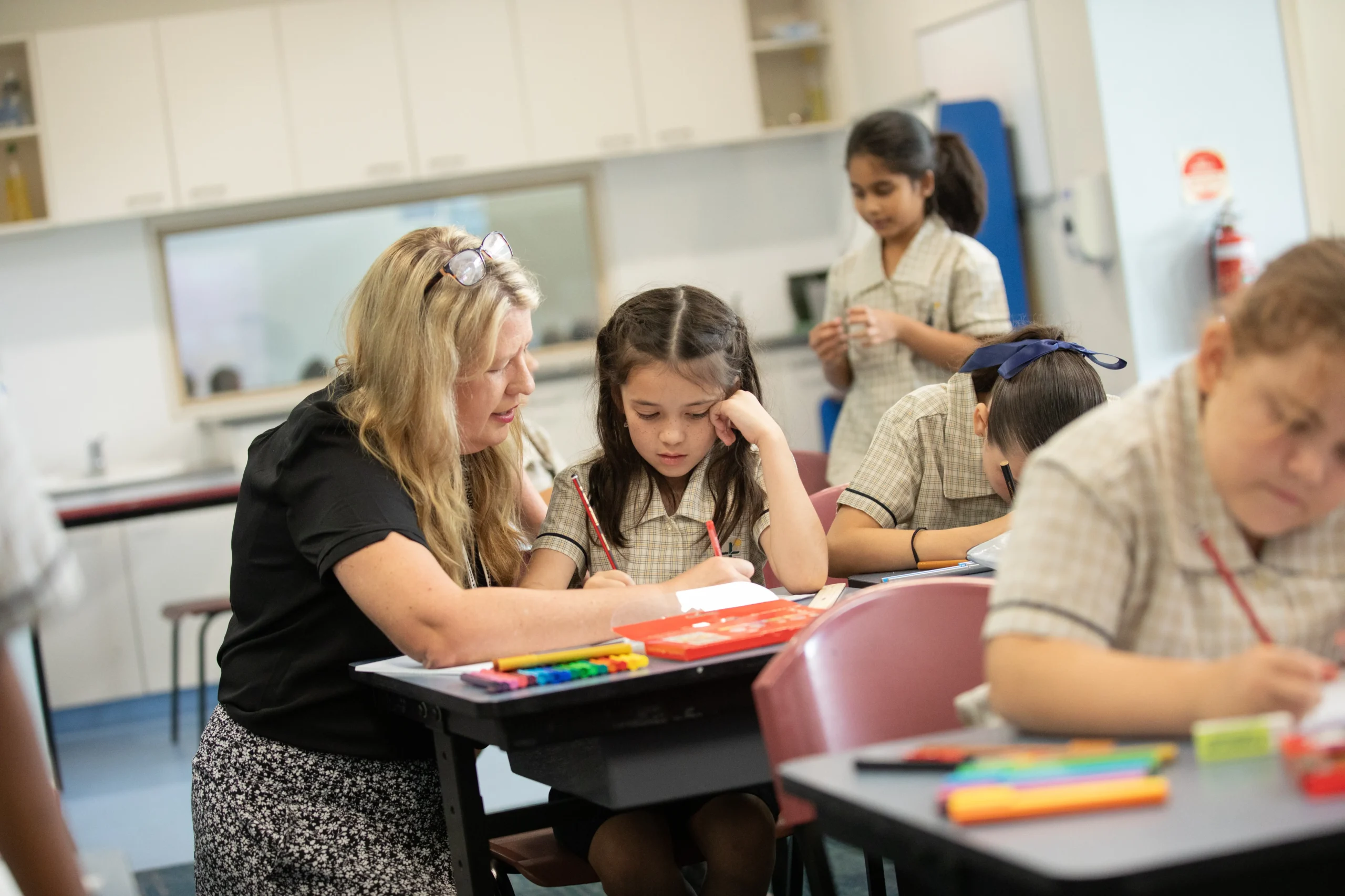 Private High School student sitting in their classroom